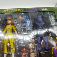 NECA Teenage Mutant Ninja Turtles April O'Neil vs. Foot Soldier (Bashed) Action Figure 2-Pack